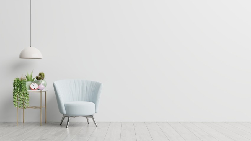 The interior has a armchair on empty white wall background.